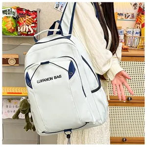 Large capacity school backpack for women, casual waterproof travel daypack with multiple pockets.