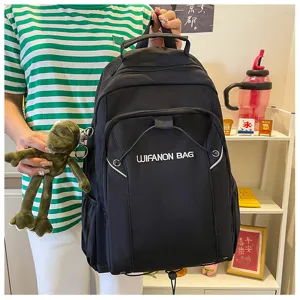 Water-resistant black backpack detail showing large capacity, perfect for school and travel use.