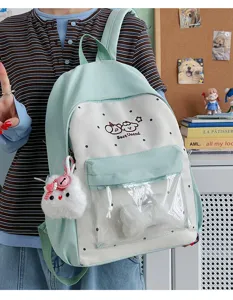 Detailed closeup view of the cute two-tone school backpack with transparent front pocket.