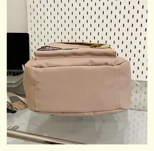 Casual large capacity student backpack bottom detail view, trendy daily campus school bag.