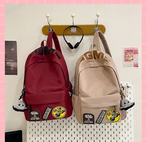 Casual large capacity canvas backpack with cute patches and octopus pendant for students.