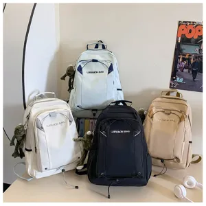 Casual waterproof student backpack with cute frog pendant, large capacity school bag for daily use