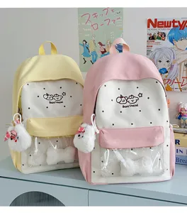 Cute college backpack with transparent front pocket and plush pendant for daily school use.