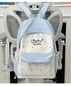 Cute aesthetic polka dot canvas school backpack with clear front pocket for daily use and styling.