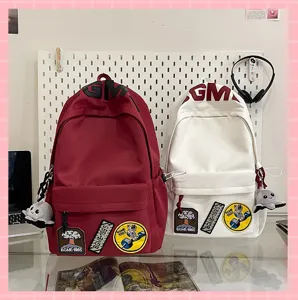 Large capacity student backpack in ins style with cute patches and dual color options for school.