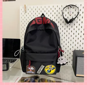 Black canvas school backpack with patches, large capacity ins style daypack for students.