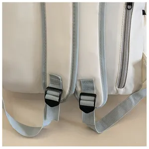 Detailed view of lightweight casual backpack straps and adjustable buckle for women daily use.