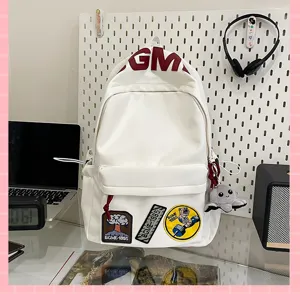 Large capacity white canvas backpack for men and women, stylish ins style school bag.