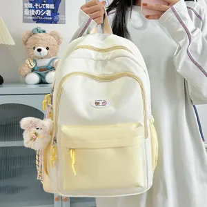 Cute star print canvas backpack for women, multi-pocket school bag for teen girls and students.