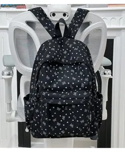Black corduroy backpack with cute heart and bow print, casual daily school bookbag for women.