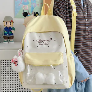 Cute pastel yellow canvas ita backpack with transparent front pocket and cute puppy embroidery.