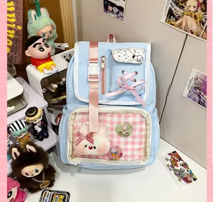Sweet Japanese style ita backpack with clear window, pink plaid pocket and cute plush bunny charm.