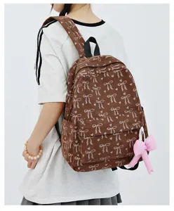 Japanese style sweet corduroy backpack with bow pattern, cute school bag for women.