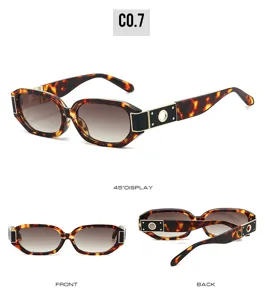 Detail view of trendy polygonal sunglasses with metal hollow temples and gradient lenses.