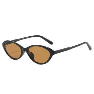 Retro cat eye sunglasses for women and men, fashion small black frame with brown lenses.