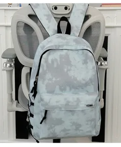 Close-up detail of the Korean style tie-dye backpack front pocket and durable fabric.