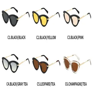 Occhiali da sole cat-eye classici con aste in metallo e diverse varianti di colore.