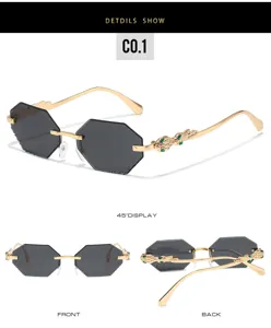 Rimless polygonal sunglasses with gold metal frame and snake decor for modern women.