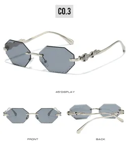 Trendy rimless polygon sunglasses with rhinestone snake temples for men and women.