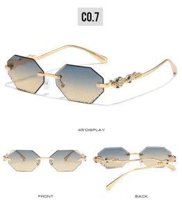 Luxury hexagonal rimless sunglasses with gradient lenses and elegant rhinestone snake temples.