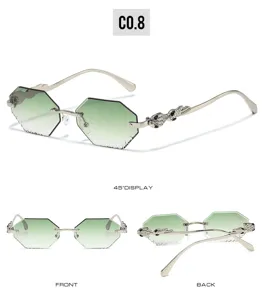 Trendy rimless polygon sunglasses with gradient green lenses and luxury diamond animal temples.