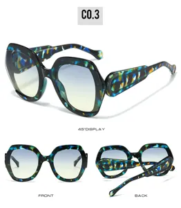Oversized hexagon sunglasses with gradient lenses and stylish carved frame design for women.