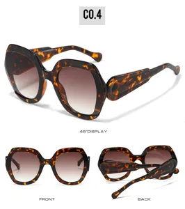 Detailed view of the hexagonal tortoise shell sunglasses showcasing the gradient lenses and frame.