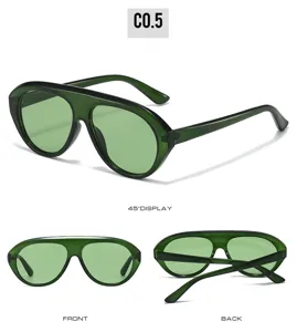 Detailed view of fashionable shield sunglasses with PC frame, metal hinges, and green lenses.