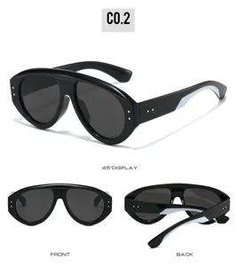 Trendy oversized black sunglasses with metal rivet details, multi-angle product display.