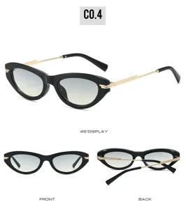 Vista dettagliata di occhiali da sole cat-eye alla moda con lenti sfumate e aste in metallo.