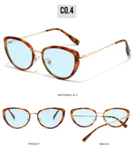 Retro cat-eye sunglasses with tortoise frame and light blue lenses for women fashion daily wear.