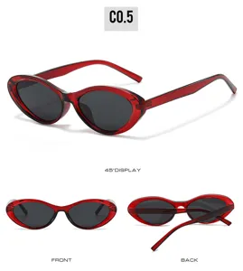 Red vintage oval sunglasses for women, trendy cat eye sun glasses with clear red frames.