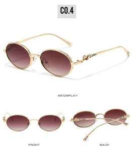Gold metal oval sunglasses with brown gradient lenses and chic panther temple design.