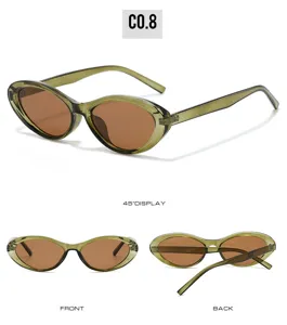 Detailed view of retro oval cat-eye sunglasses with green translucent frame and brown lenses.