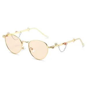 Eleganti occhiali da sole dorati in metallo con strass di cristallo e catene per donne.