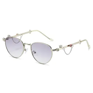 Occhiali da sole ovali in metallo con strass di cristallo alla moda da donna sfumati principale