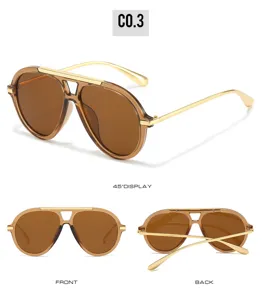 Detailed view of vintage pilot sunglasses with brown lenses and golden metal frames.