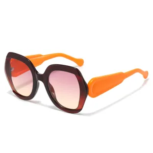 Oversized polygon fashion sunglasses with gradient lenses and bright orange thick temples