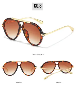 Vintage oversized pilot sunglasses for women, gradient lenses with tortoishell frame.