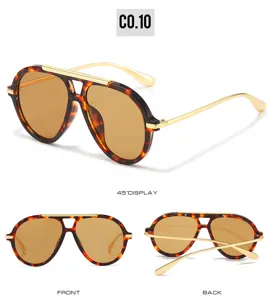 Vintage tortoise shell aviator sunglasses for women, oversized frame with gold metal temples.