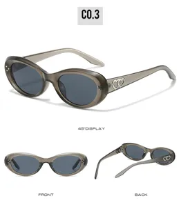 Fashion oval cat-eye sunglasses with double heart temple decor for men and women trendy sun