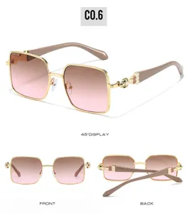 Chic square sunglasses for women, gradient lenses, metallic gold frame with detail.