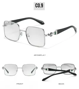 Square metal frame sunglasses with luxury green stone hinge details for women fashion.