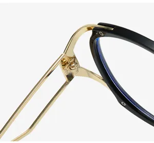 Close-up detail of retro cat-eye anti-blue light glasses metal hinge and black frame.