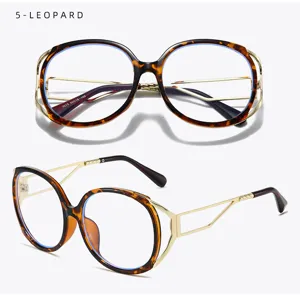Detailed view of vintage cat-eye anti-blue light glasses with leopard frame and gold temples.