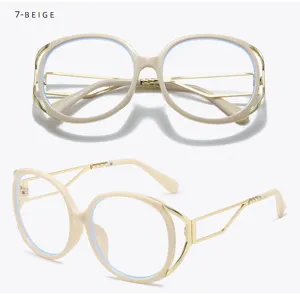 Detailed view of oversized vintage blue light blocking glasses with chic gold and beige frame.