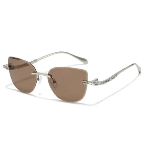 Fashion rimless sunglasses for women, gradient brown lenses with rhinestone temples and chic design.