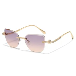 Fashion rimless diamond-cut gradient cat-eye sunglasses with luxury crystal metal temples.