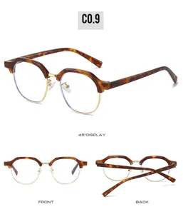 Detail view of vintage tortoise shell half-rim round glasses with gold metal frame for women.