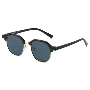 Trendy half-frame sunglasses for women, chic black and gold round frame fashion eyewear.